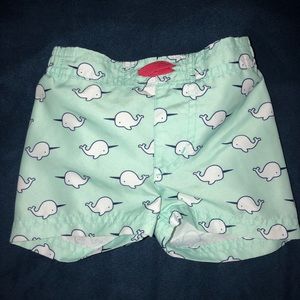 Narwhal swim trunks